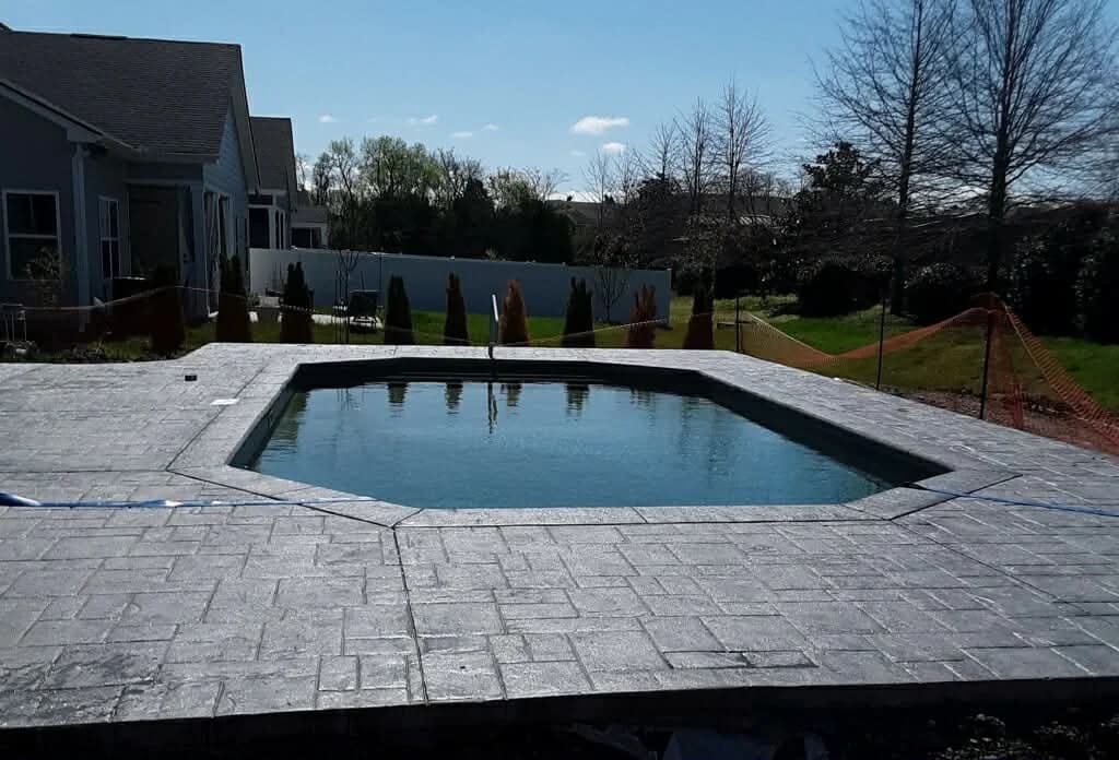 Octagonal pool with stamped concrete deck